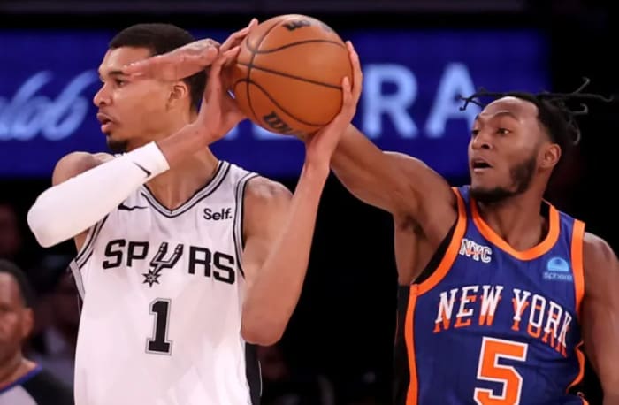 Quickley (5) guards San Antonio Spurs star Victor Wembanyama in Wednesday's win over San Antonio